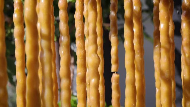 Traditional Cypriot Soutzoukos or shoushoukos, similar to churchkhela candy in Letymbou, Cyprus, 4k