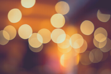 abstract blur bokeh of casino background,orang and blue light bokeh in retro color tone