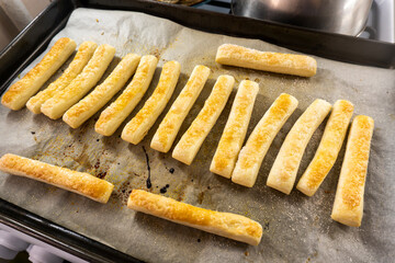 puff pastry sticks on a wooden background. Food concept. Bakery.
