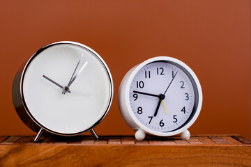 white alarm clock stop watch photo