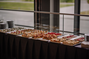 various snacks laid out on a buffet table