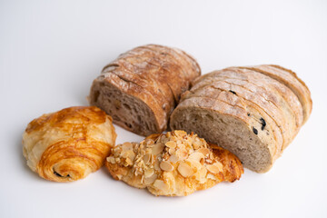 Crossaint and Sourdough in isolated white background