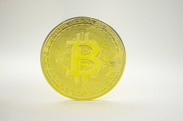 Gold coin Bitcoin on white background. The concept of crypto currency. Blockchain technology.