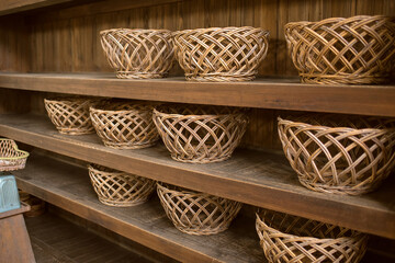 銭湯・温泉の脱衣所　並んだ脱衣かご・籐のバスケット　Clothes baskets at changing room in Sento (Japanese public bathhouse)