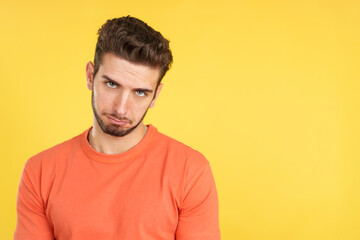 Fototapeta premium Caucasian man making a pity face to ask for something