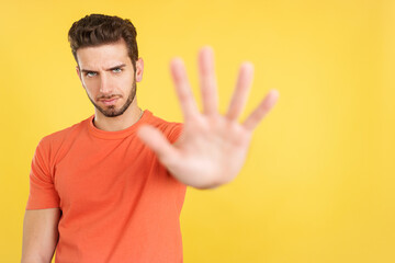 Fototapeta premium Caucasian man gesturing prohibition with hand