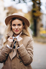 Portrait of beautiful woman in trendy outfit