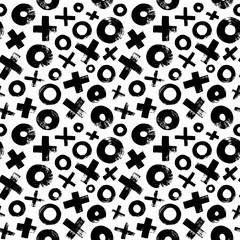 XO seamless pattern. Brush drawn crosses and circles. Vector black and white geometric ornament. Grunge texture with symbols of zero and cross. Trendy graphic design with black ink brush strokes.