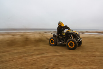 athlete drifting on a quad bike