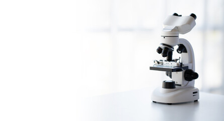 Close-up shot of Scientific Microscope in a Bright Modern Laboratory.