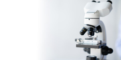 Close-up shot of Scientific Microscope in a Bright Modern Laboratory.