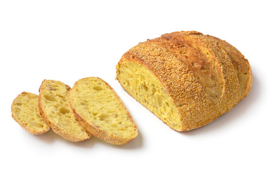 Fresh baked corn bread loaf and slices isolated on white background close up