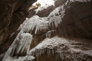 Deep Gorge - Partnachklamm ( Partnach Gorge ) snow-covered rocks and icicles in winter, Garmisch-Partenkirchen, Bavaria, Germany