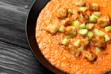 Traditional spanish Gazpacho soup with tomatoes, vegetables and croutons. Healthy summer food