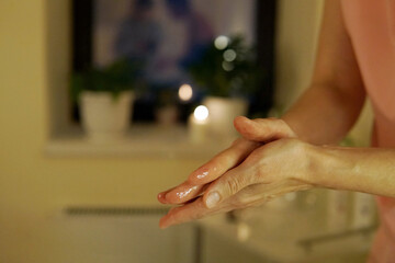 massage. Massage therapist's hands in oil