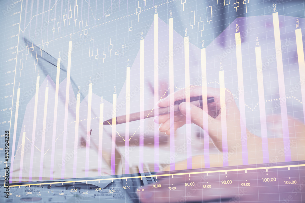 Poster multi exposure of woman hands typing on computer and financial graph hologram drawing. stock market 
