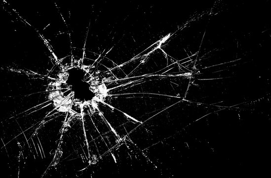 Pieces of destructed Shattered glass. Royalty high-quality free stock photo image of broken glass with sharp pieces. Break glass white and black overlay grunge texture abstract on black background