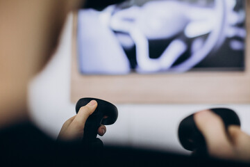 Man playing using  vr glasses   © Petro