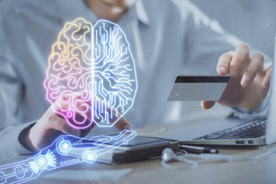 Double exposure of man hands typing on computer with credit card and brain theme drawing. E-commerce and AI concept.