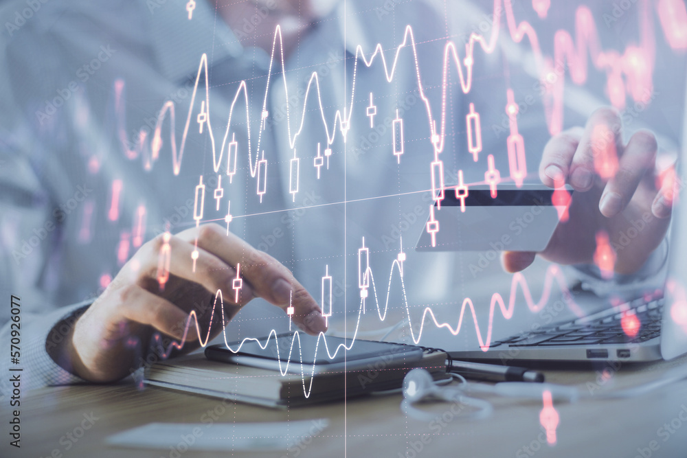 Poster double exposure of man hands holding a credit card and forex graph drawing. stock trading and digita