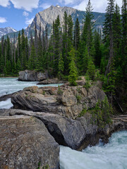 The Kicking Horse river flows through the split rock near Jasper Canada - 570926457