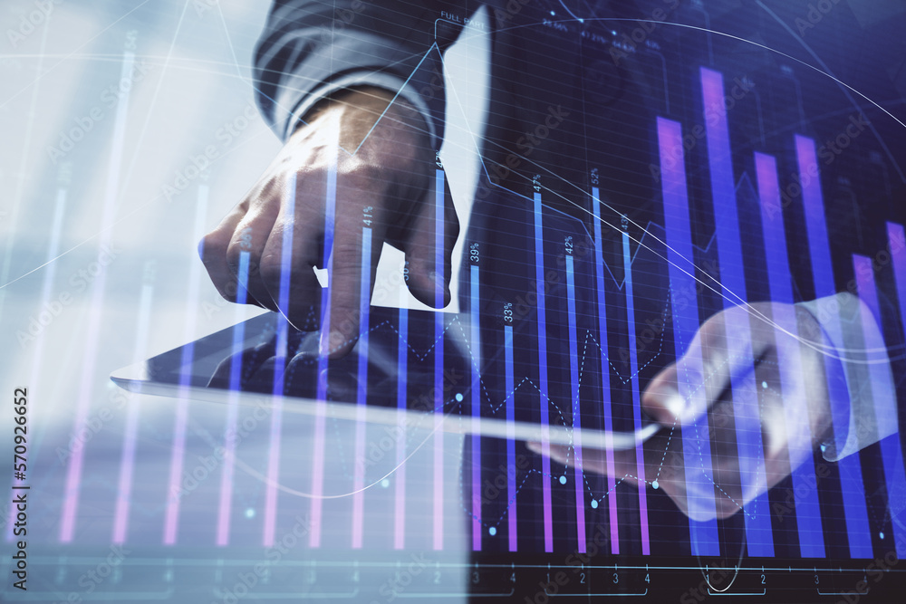 Aufkleber Double exposure of man's hands holding and using a digital device and forex graph drawing. Financial market concept.