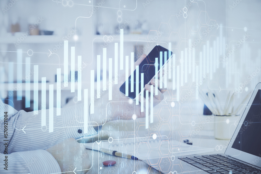Poster double exposure of man's hands holding and using a digital device and forex graph drawing. financial