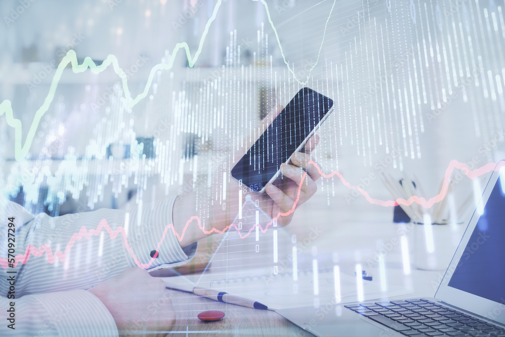 Poster Double exposure of man's hands holding and using a digital device and forex graph drawing. Financial market concept.