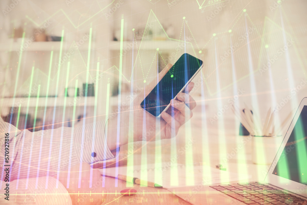 Aufkleber double exposure of man's hands holding and using a digital device and forex graph drawing. financial