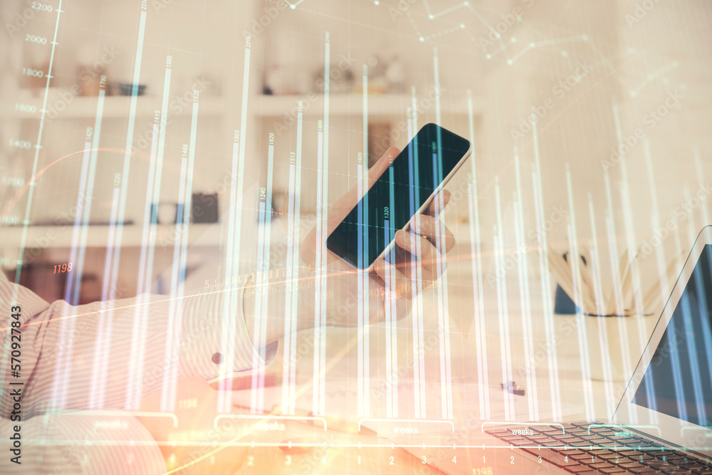Poster double exposure of man's hands holding and using a digital device and forex graph drawing. financial