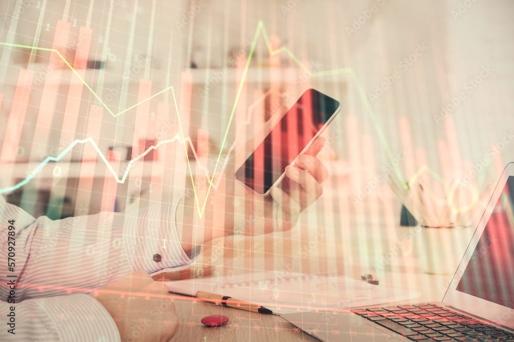 Poster Double exposure of man's hands holding and using a digital device and forex graph drawing. Financial market concept.