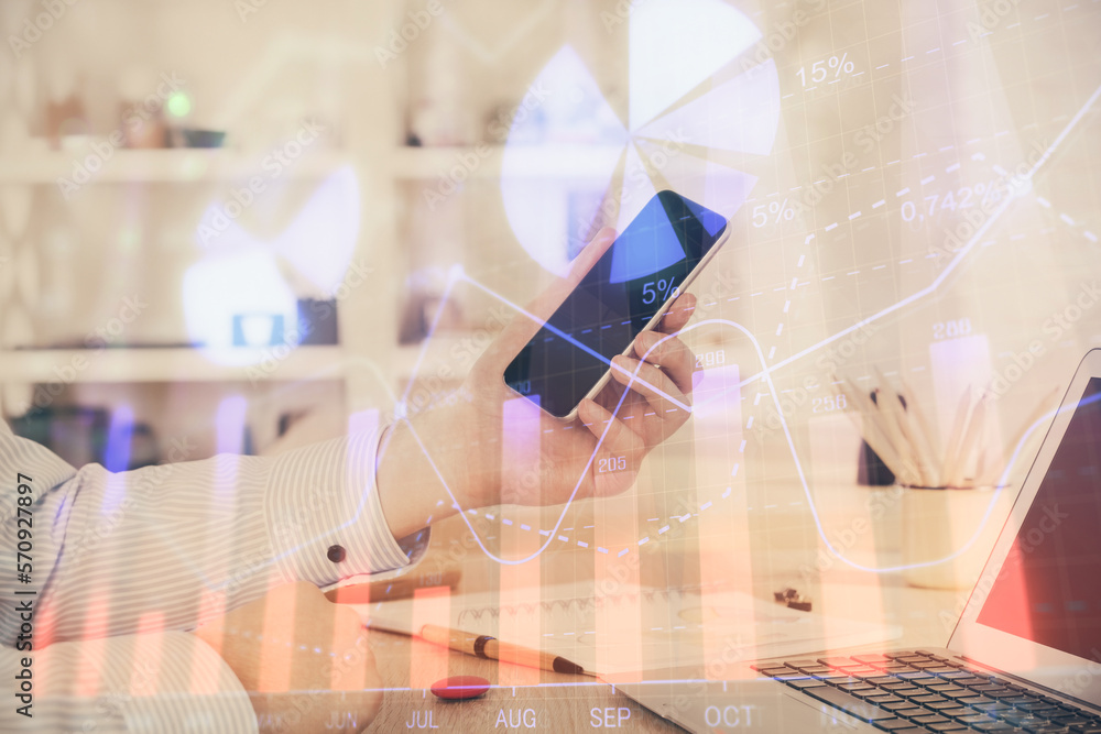 Poster double exposure of man's hands holding and using a digital device and forex graph drawing. financial