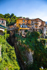 Fototapeta na wymiar Aerial view of Nesso, a picturesque and colourful village sitting on the banks of Lake Como, Italy