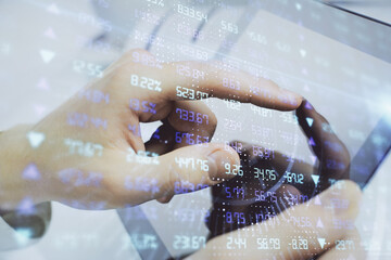 Multi exposure of man's hands holding and using a phone and financial chart drawing. Market analysis concept.