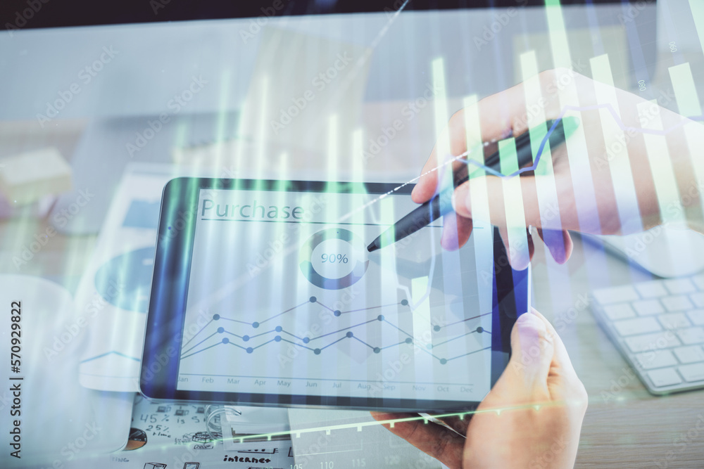 Poster double exposure of man's hands holding and using a phone and financial chart drawing. market analysi
