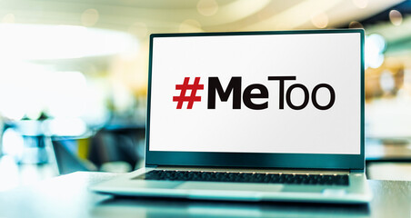 Laptop computer displaying the sign of MeToo movement