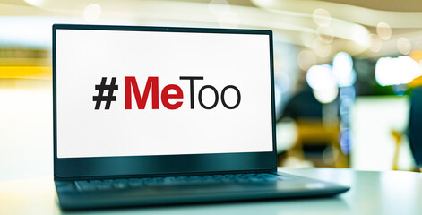 Laptop computer displaying the sign of MeToo movement