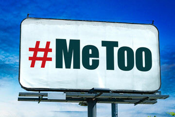 Advertisement billboard displaying the sign of MeToo movement