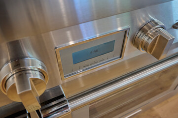 Closeup of Stainless Steel knobs and controls for Oven - 570932236