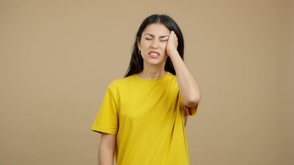 Caucasian woman gesturing bodily discomfort and headache