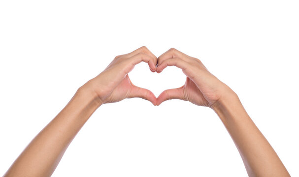 Woman hands making a heart shape on a white isolated background