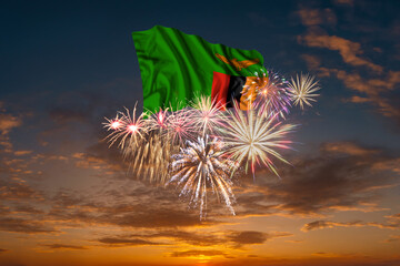 Flag of Zambia and Holiday fireworks in sky