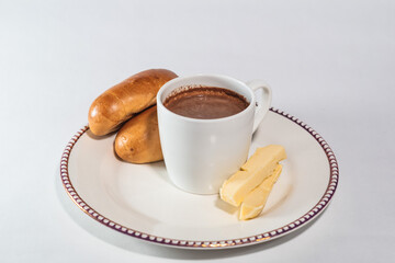 Hot chocolate drink with cheese and bread, isolated, white background