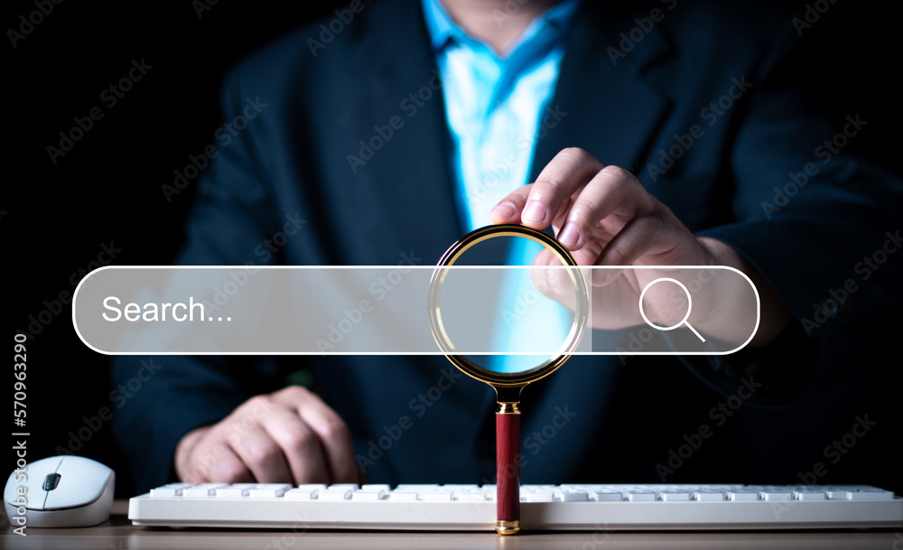Poster data search technology search engine optimization. man hand holding magnifying glass to searching fo