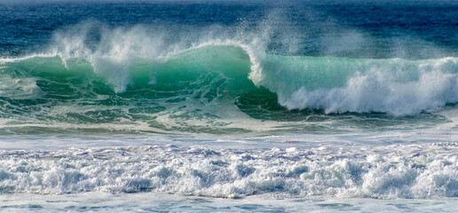 Waves on the blue green atlantic ocean off the coast of portugal