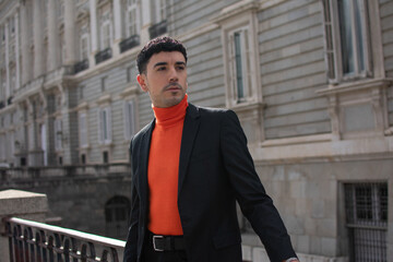 Stylish elegant men man in coat in urban style
