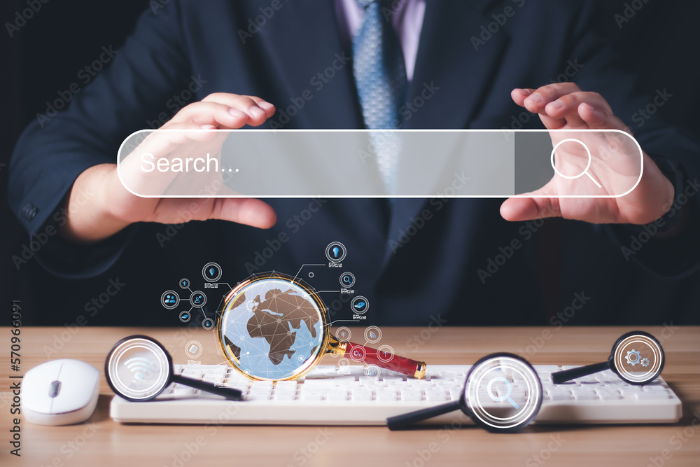 Poster data search technology search engine optimization. businessman holding a search bar with a magnifyin