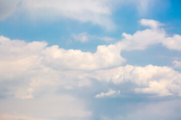 Beautiful clouds against the blue sky. Fluffy clouds, cloudy weather.