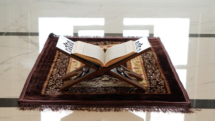 Quran - the holy islamic book on the lauh in the mosque. quran. baca quran.ayo ngaji
