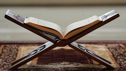 Quran - the holy islamic book on the lauh in the mosque. quran. baca quran.ayo ngaji